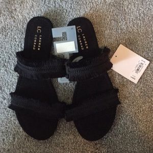 Black slip on sandals